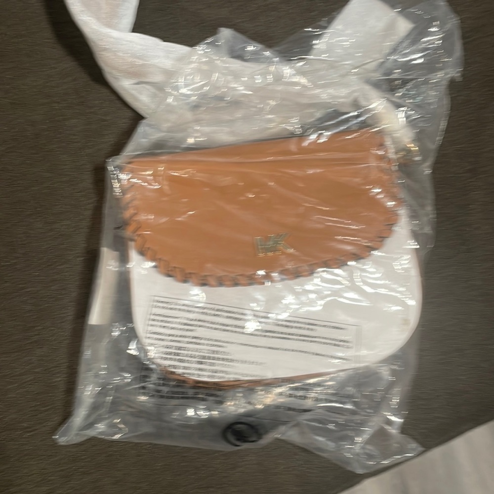 Michael Kors shoulder bag . Beige and tan color . Never used